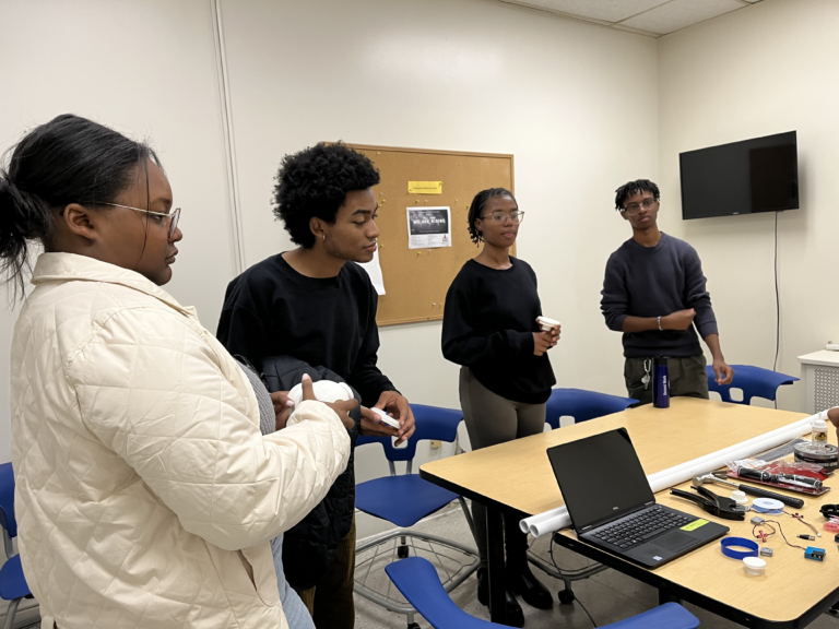 CORE Futures Lab students building an IoT air quality monitor and drafting a community data sovereignty and control plan.